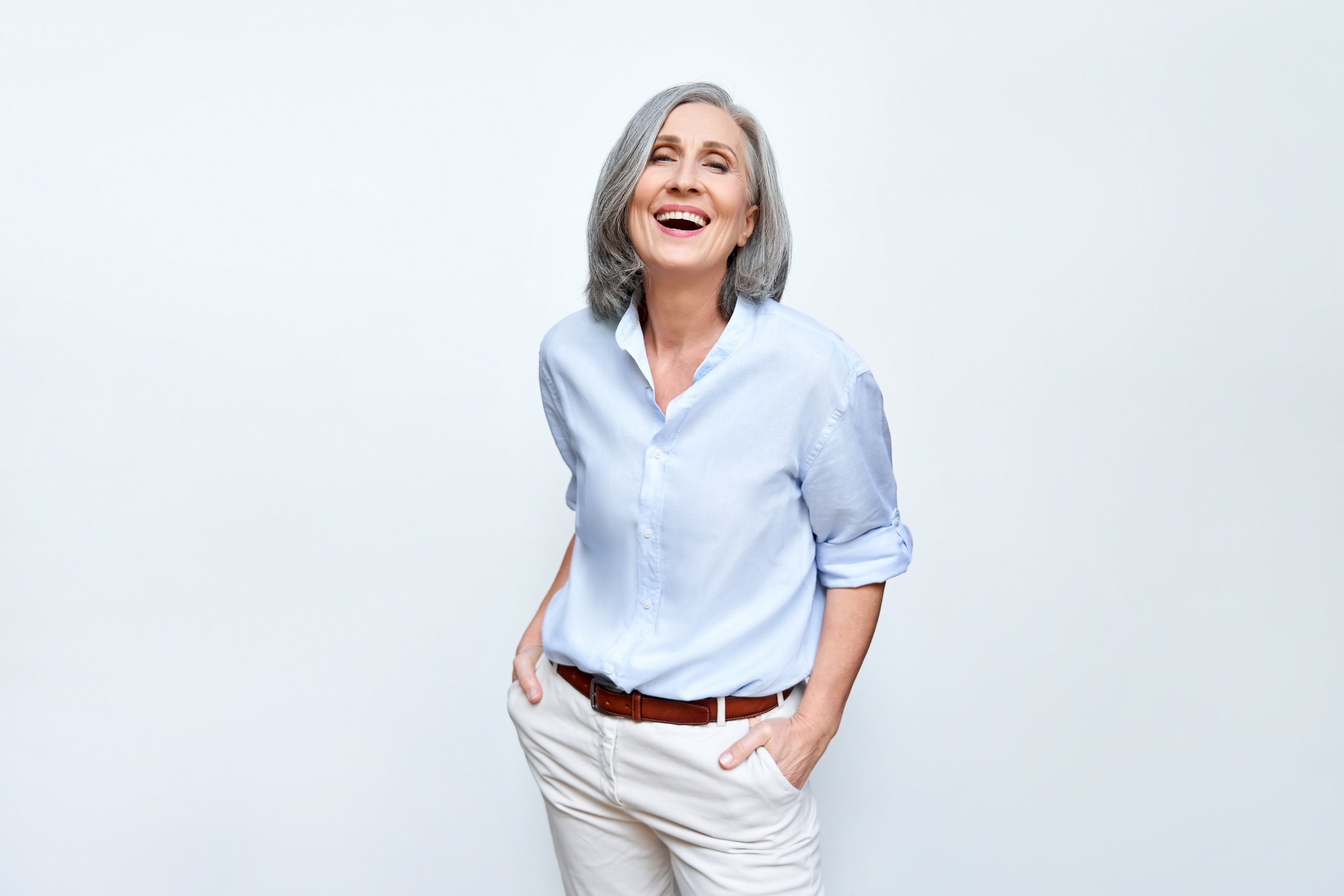 Mature Senior Business Woman Laughing 